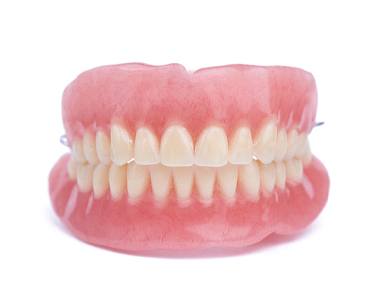 Full set of traditional dentures for upper and lower arches