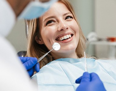 a patient receiving dental implant care in Wauwatosa