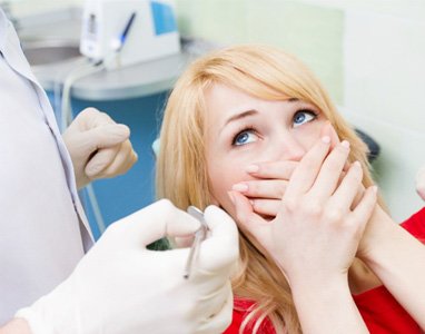 Woman nervous at the dentist